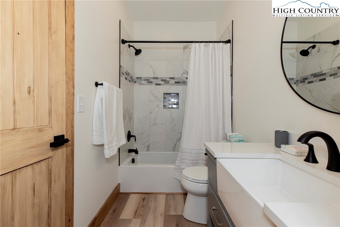 Lot 3 Old Hampton Road Boone, NC 28607 - Photo 28 of 32 a bathroom with a sink toilet and shower
