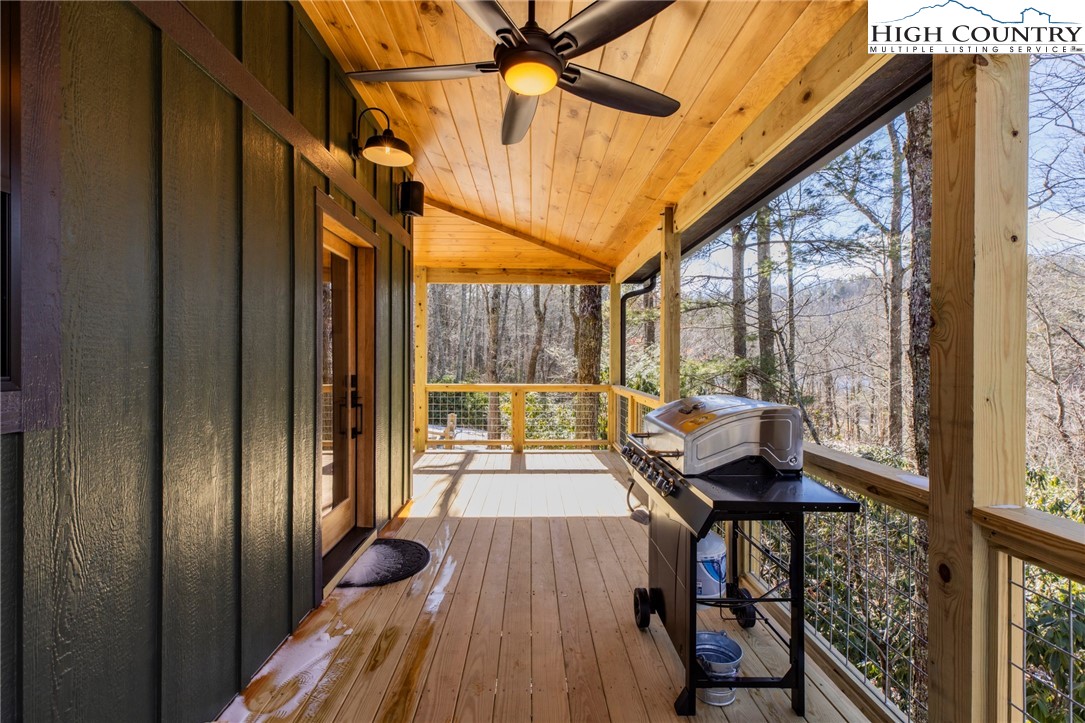 Lot 3 Old Hampton Road Boone, NC 28607 - Photo 31 of 32 a view of balcony with couch and wooden floor