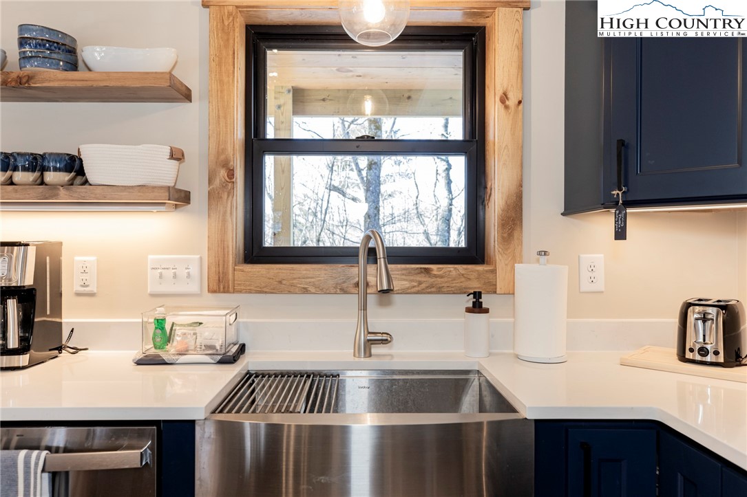 Lot 3 Old Hampton Road Boone, NC 28607 - Photo 7 of 32 a kitchen with stainless steel appliances a sink a stove and a microwave