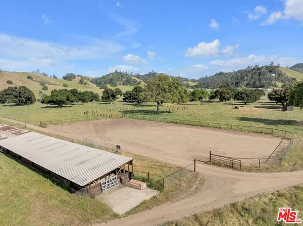 a view of a lake with a yard