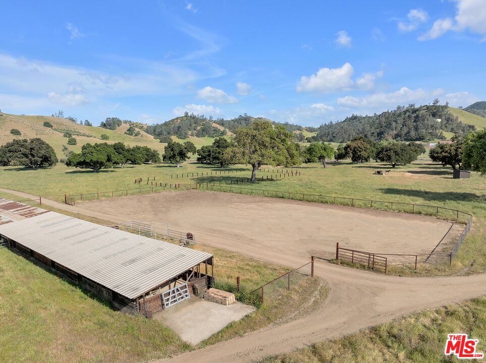 770 Limekiln Road Hollister, CA 95023 - Photo 17 of 39 a view of a lake with a yard