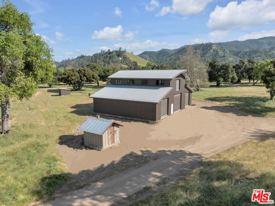 770 Limekiln Road Hollister, CA 95023 - Photo 19 of 39 a view of a house with a yard
