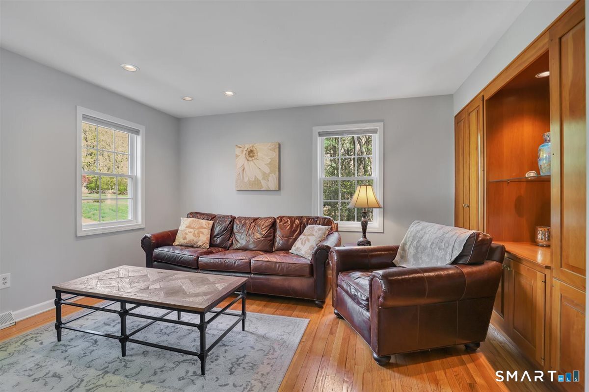 9 Academy Road Trumbull, CT 06611 - Photo 14 of 35 a living room with furniture and a window