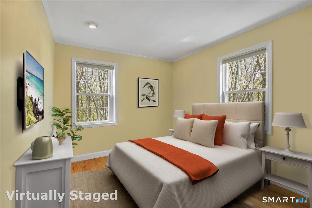 9 Academy Road Trumbull, CT 06611 - Photo 18 of 35 a bedroom with a bed and a couch