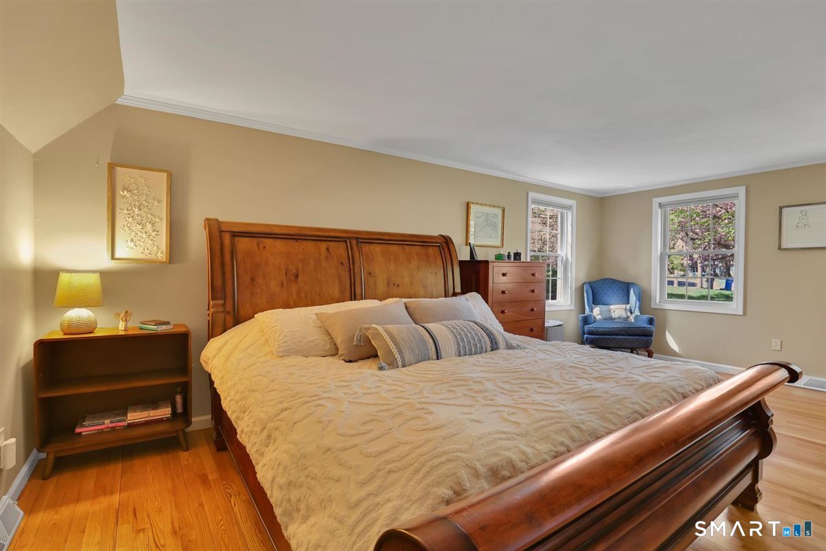 9 Academy Road Trumbull, CT 06611 - Photo 22 of 35 a bedroom with a bed and window