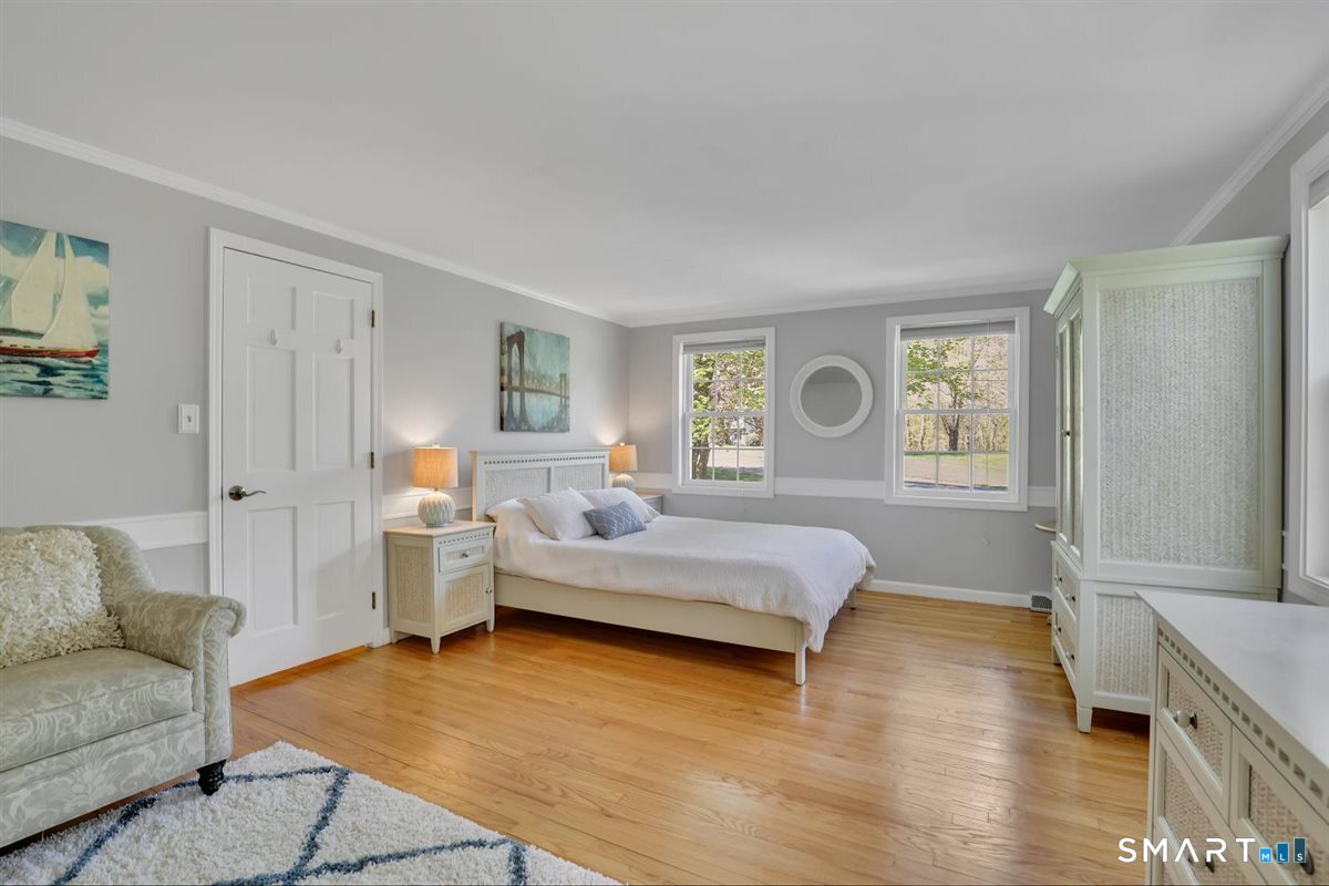 9 Academy Road Trumbull, CT 06611 - Photo 25 of 35 a living room with furniture and a large window