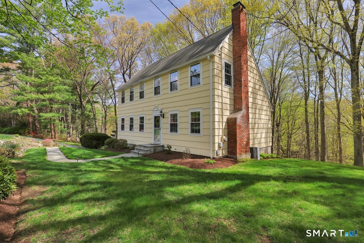 9 Academy Road Trumbull, CT 06611 - Photo 3 of 35 a view of a house with a yard