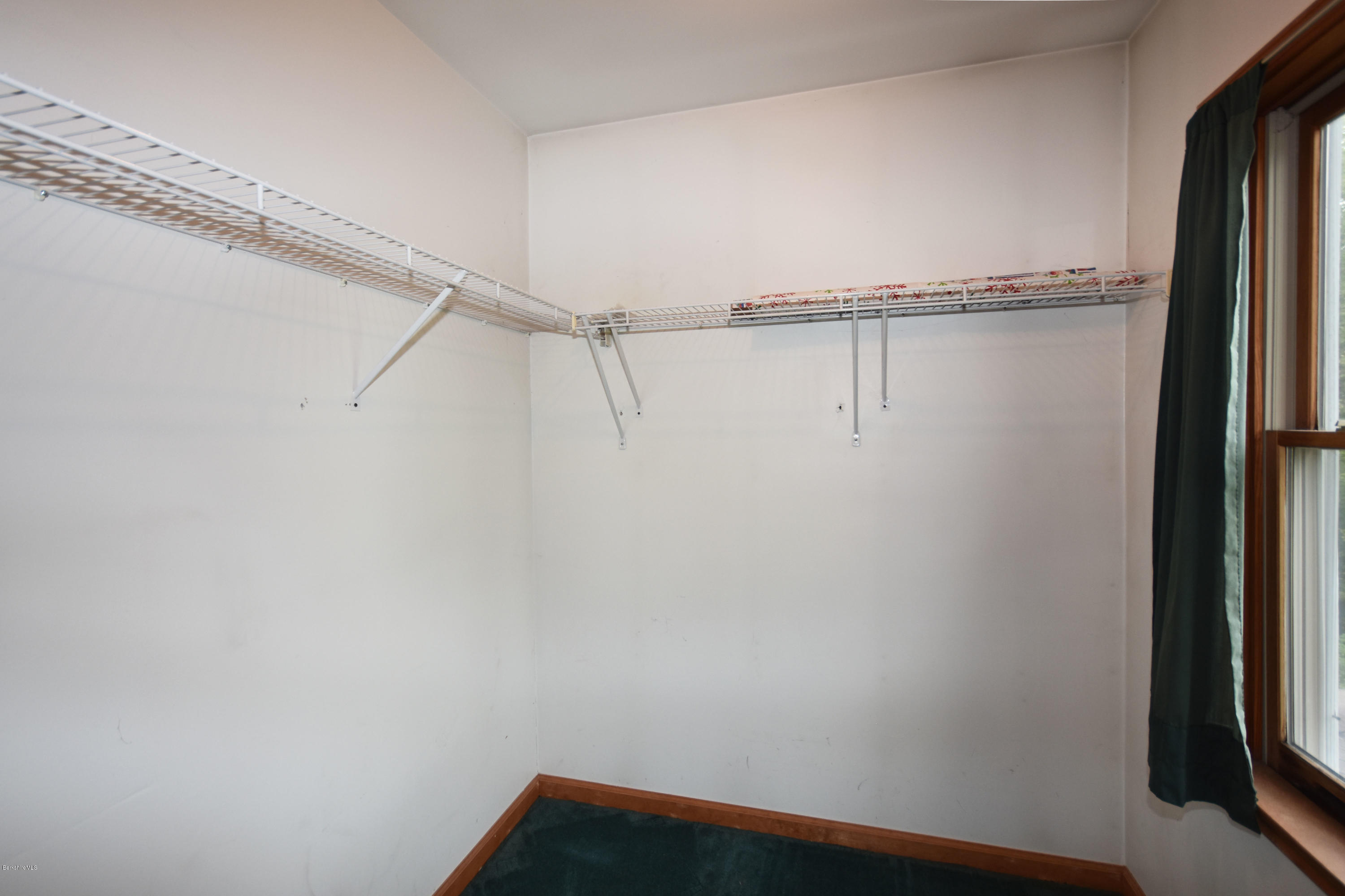 96 East Main Road Peru, MA 01235 - Photo 22 of 42 a view of small space with racks on the wall