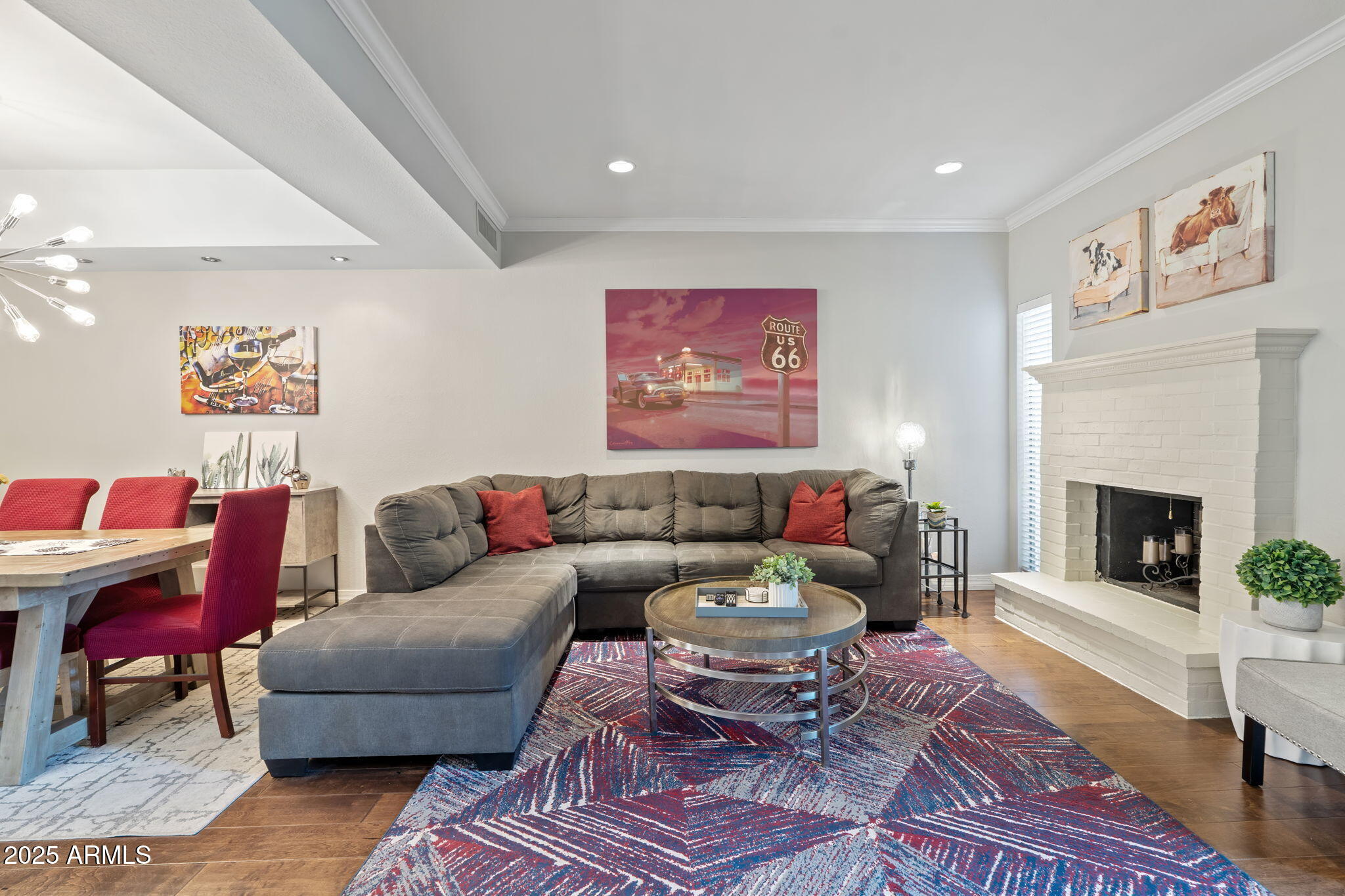 6229 North 30th Way Phoenix, AZ 85016 - Photo 11 of 58 a living room with furniture a rug and a fireplace