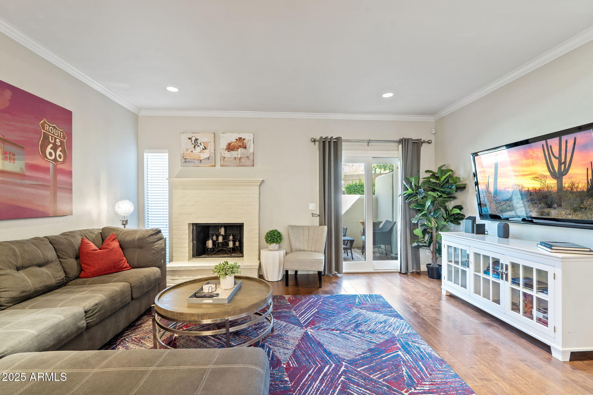 6229 North 30th Way Phoenix, AZ 85016 - Photo 10 of 58 a living room with furniture and a fireplace