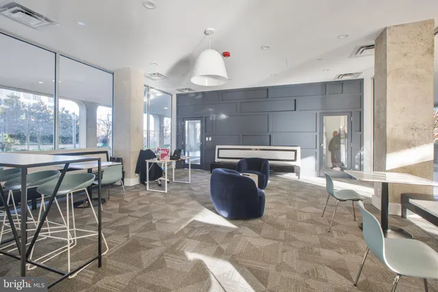 a kitchen with a sink and refrigerator