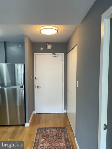 a kitchen with a stove and a microwave