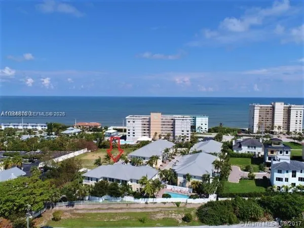 an aerial view of residential building with outdoor space