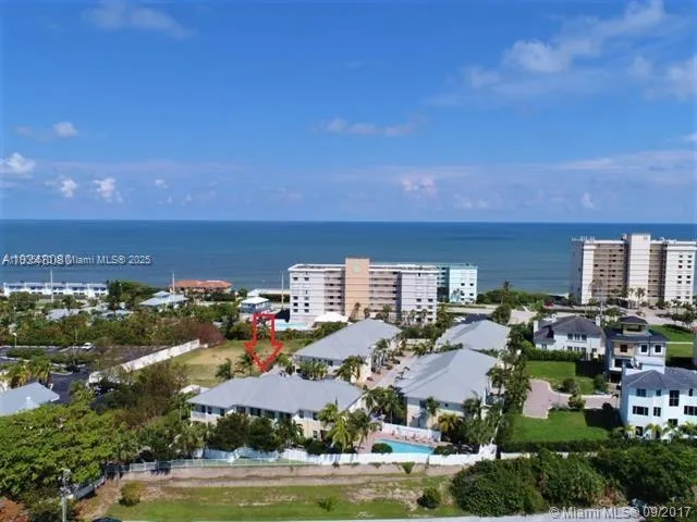an aerial view of residential building with outdoor space