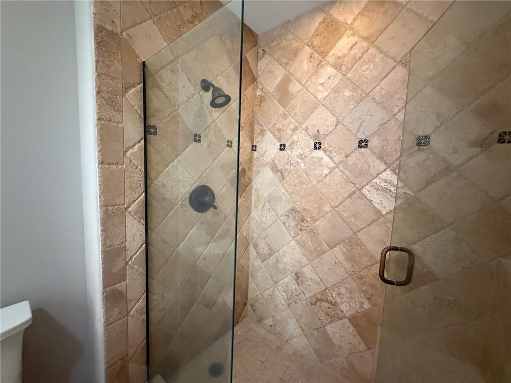 2255 Peachtree Road Northeast, Unit 322 Atlanta, GA 30309 - Photo 17 of 25 a bathroom with a shower