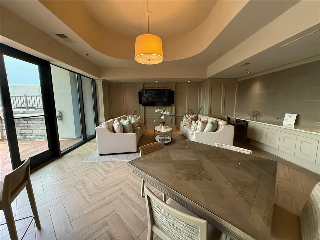 2255 Peachtree Road Northeast, Unit 322 Atlanta, GA 30309 - Photo 23 of 25 a bedroom with a bed and window