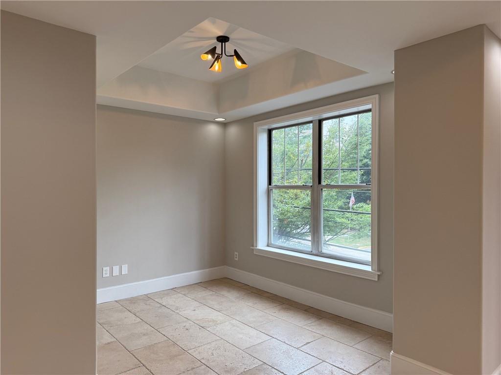 2255 Peachtree Road Northeast, Unit 322 Atlanta, GA 30309 - Photo 10 of 25 a view of an empty room with a window