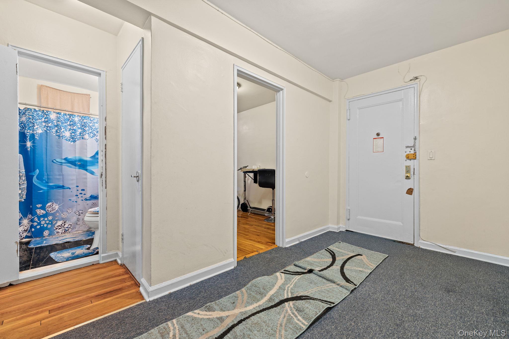 2105 Wallace Avenue, Unit 5A Bronx, NY 10462 - Photo 6 of 15 a bedroom with a bed and a window
