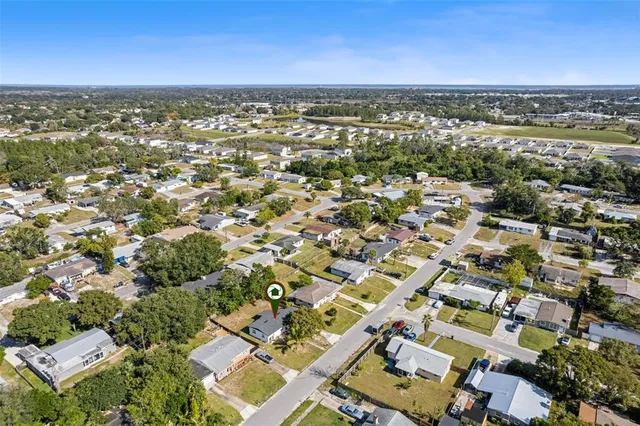 an aerial view of residential building with parking space