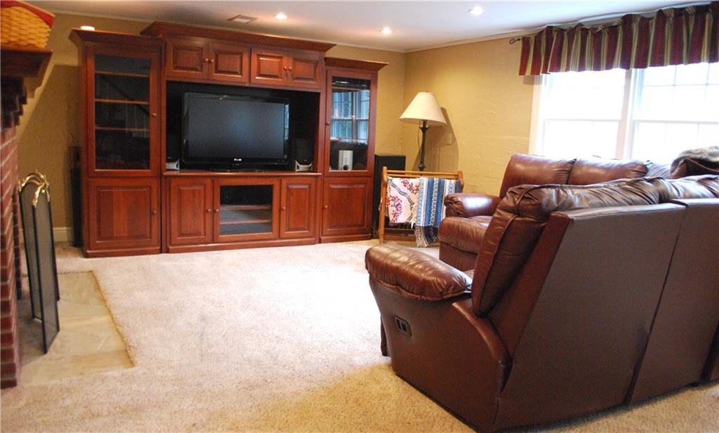 250 Crestmont Road Pittsburgh, PA 15237 - Photo 14 of 23 Family Room with Gas Fireplace- the perfect spot for Movie Night!