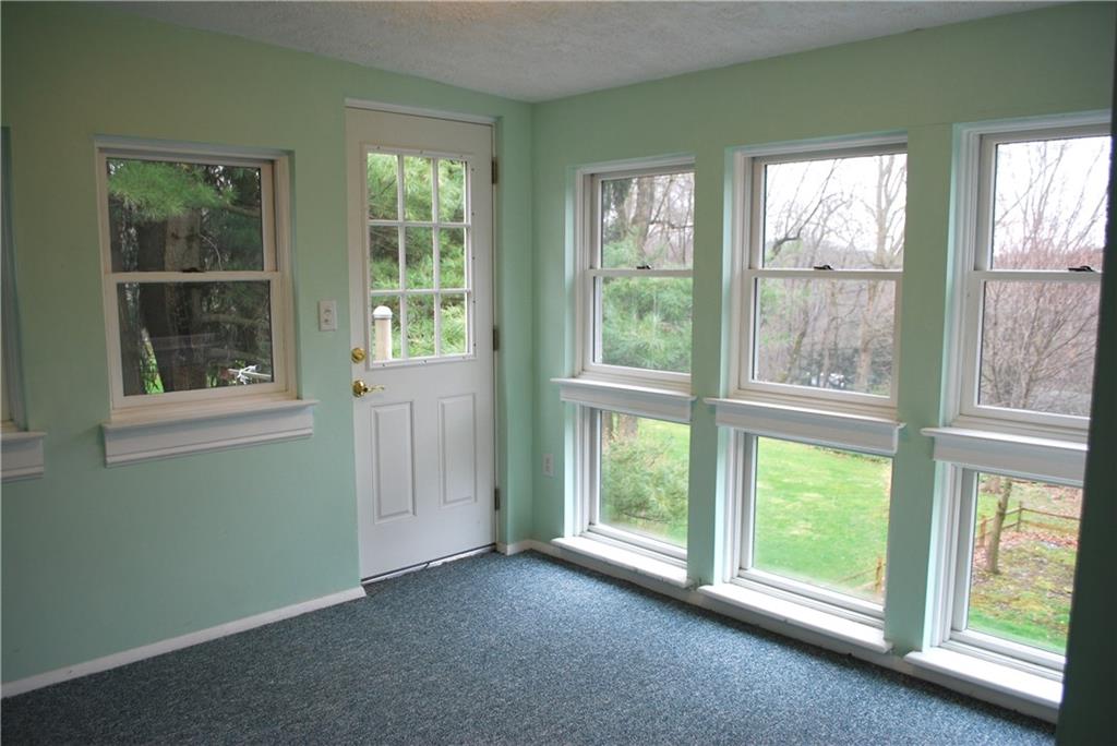 250 Crestmont Road Pittsburgh, PA 15237 - Photo 22 of 23 In-Law Suite Sunroom overlooking back yard. This Suite is large enough for both parents or young adults who have "Returned to the Nest"!