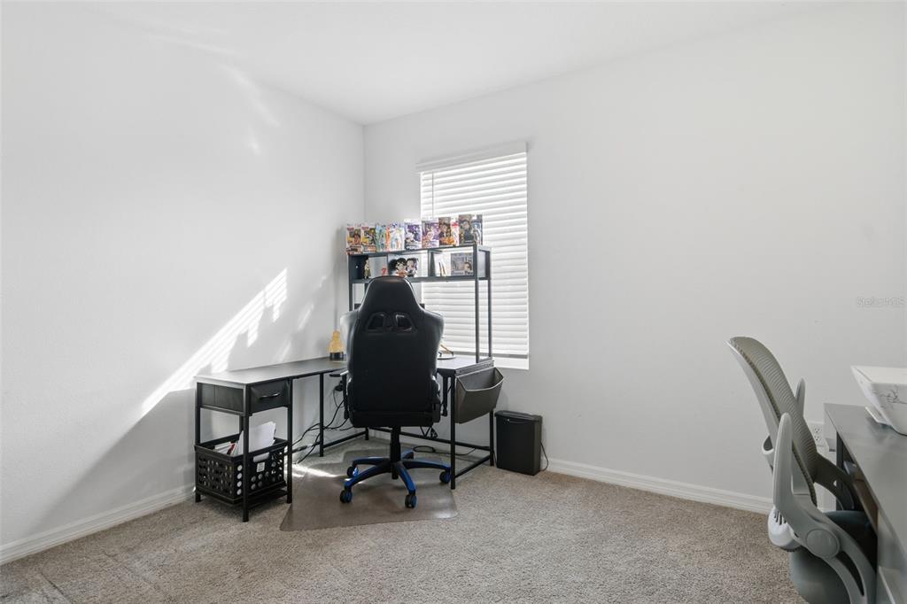 3844 Sunny Spring Street Plant City, FL 33565 - Photo 11 of 26 a view of a workspace with furniture