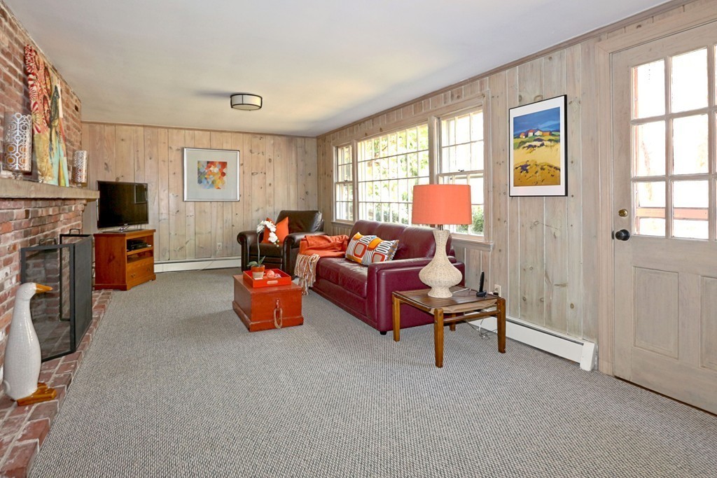 10 Sears Road Wayland, MA 01778 - Photo 9 of 16 a room with furniture and a window
