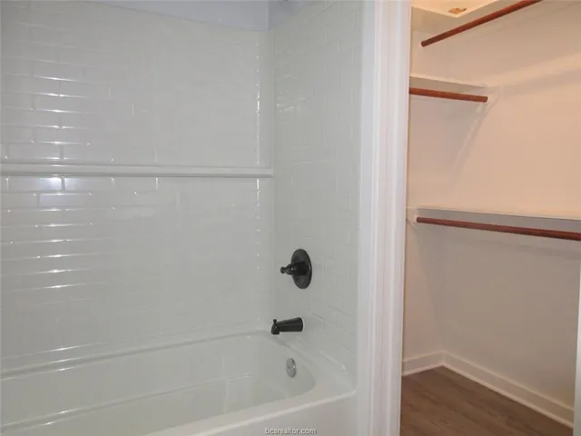 a bathroom with a bathtub