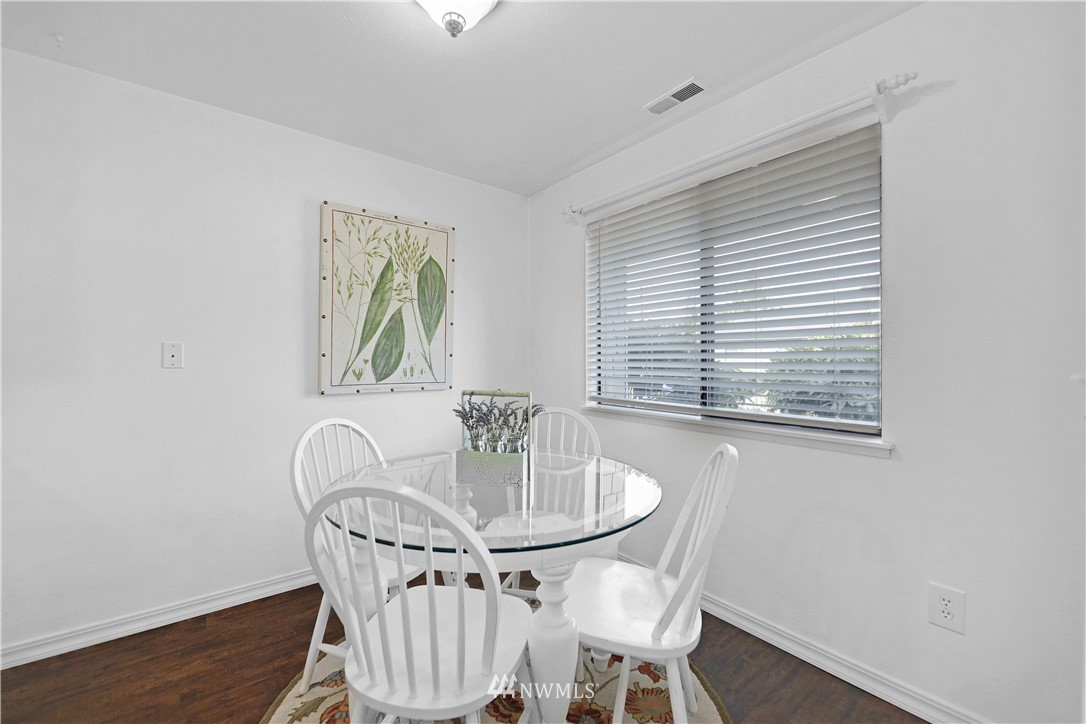 21529 4th Avenue West, Unit C33 Bothell, WA 98021 - Photo 8 of 35 a dining room with furniture and window