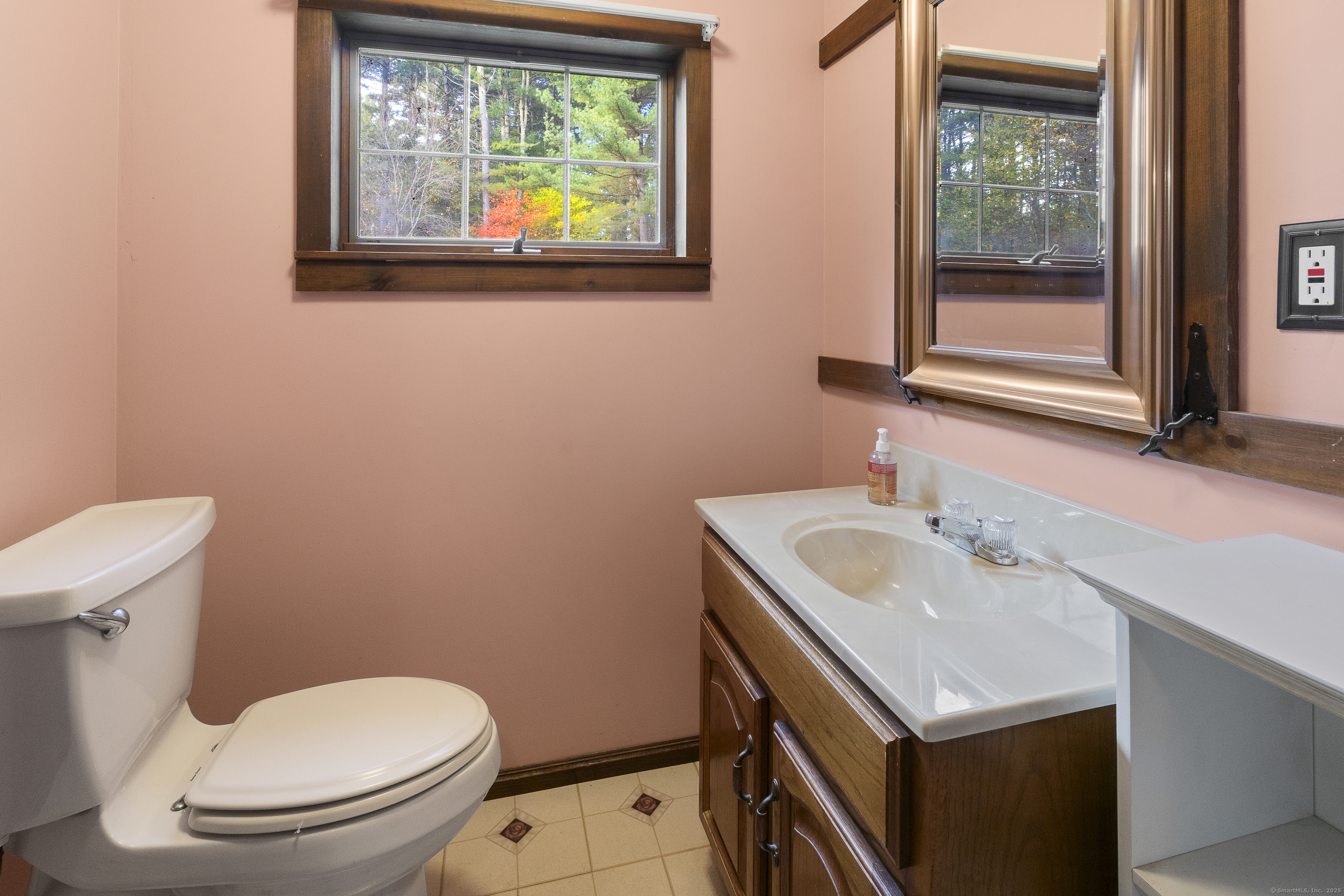 160 Munyan Road Putnam, CT 06260 - Photo 18 of 36 a bathroom with a sink a toilet and a mirror