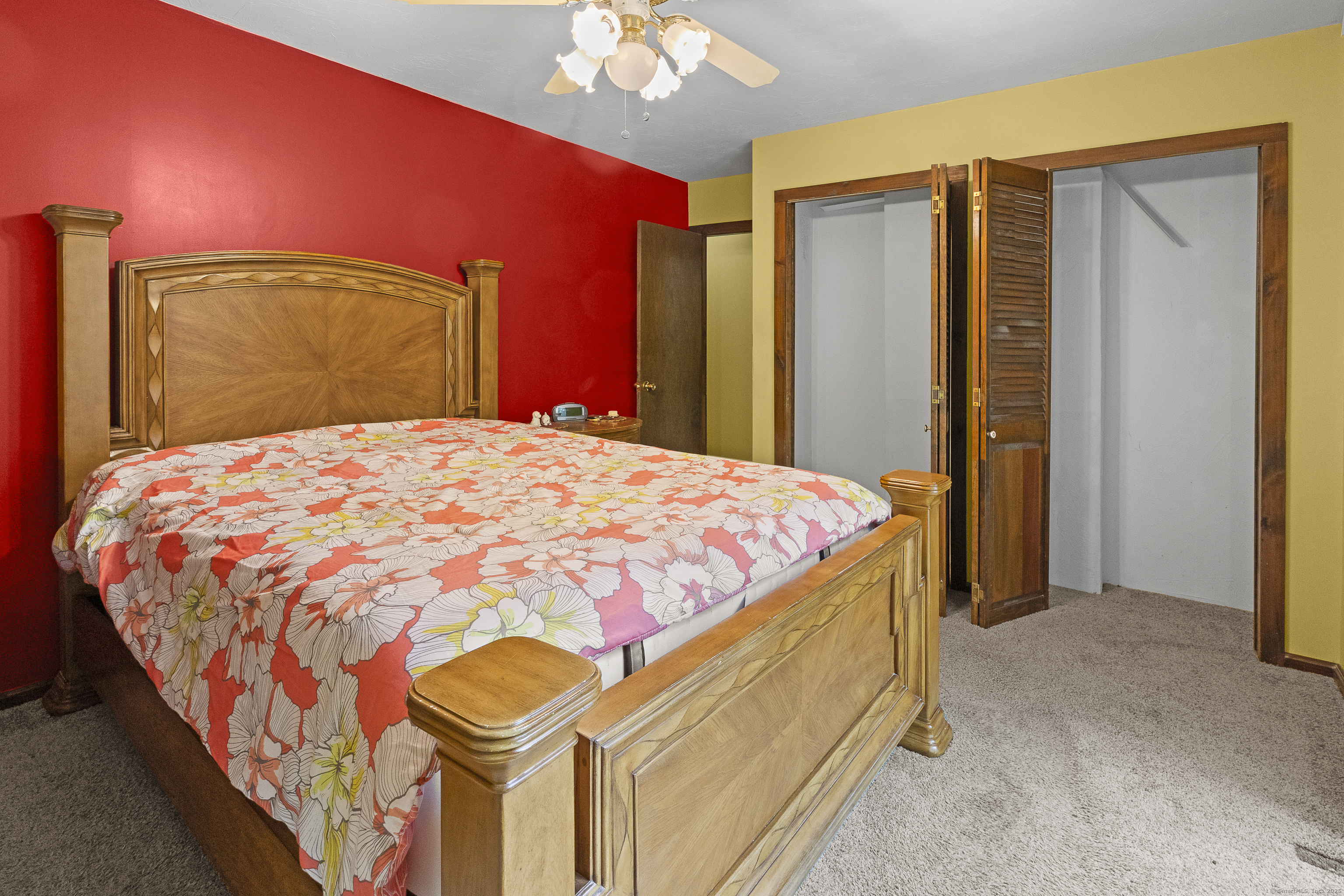 160 Munyan Road Putnam, CT 06260 - Photo 20 of 36 a bedroom with a bed and a closet