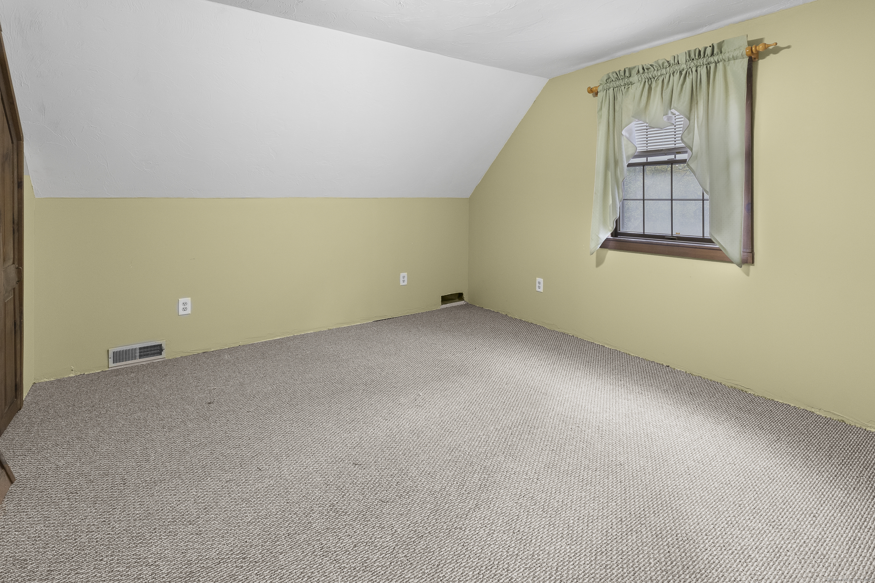 160 Munyan Road Putnam, CT 06260 - Photo 22 of 36 an empty room with windows and painted walls