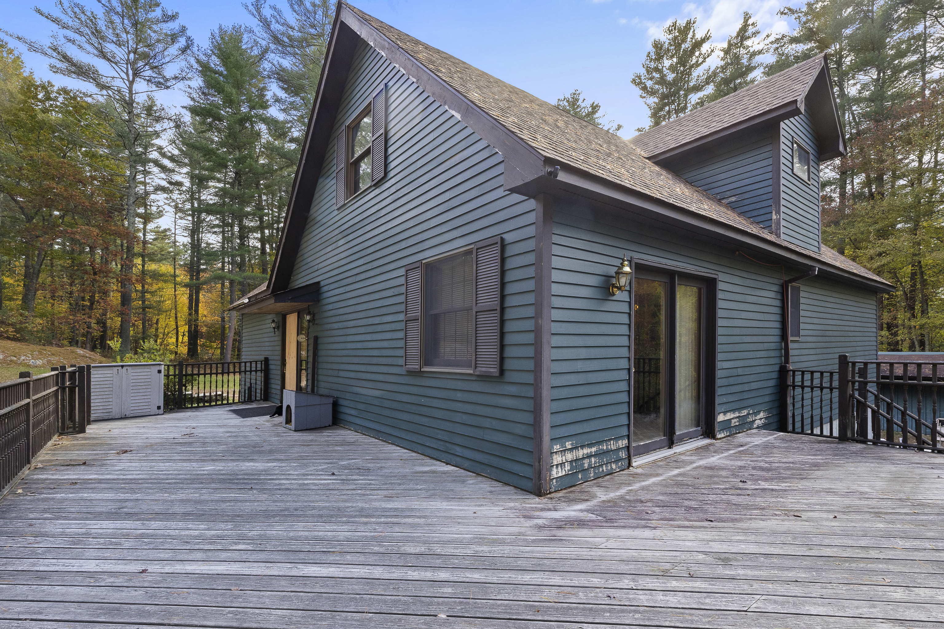 160 Munyan Road Putnam, CT 06260 - Photo 31 of 36 a view of a house with a backyard and trees