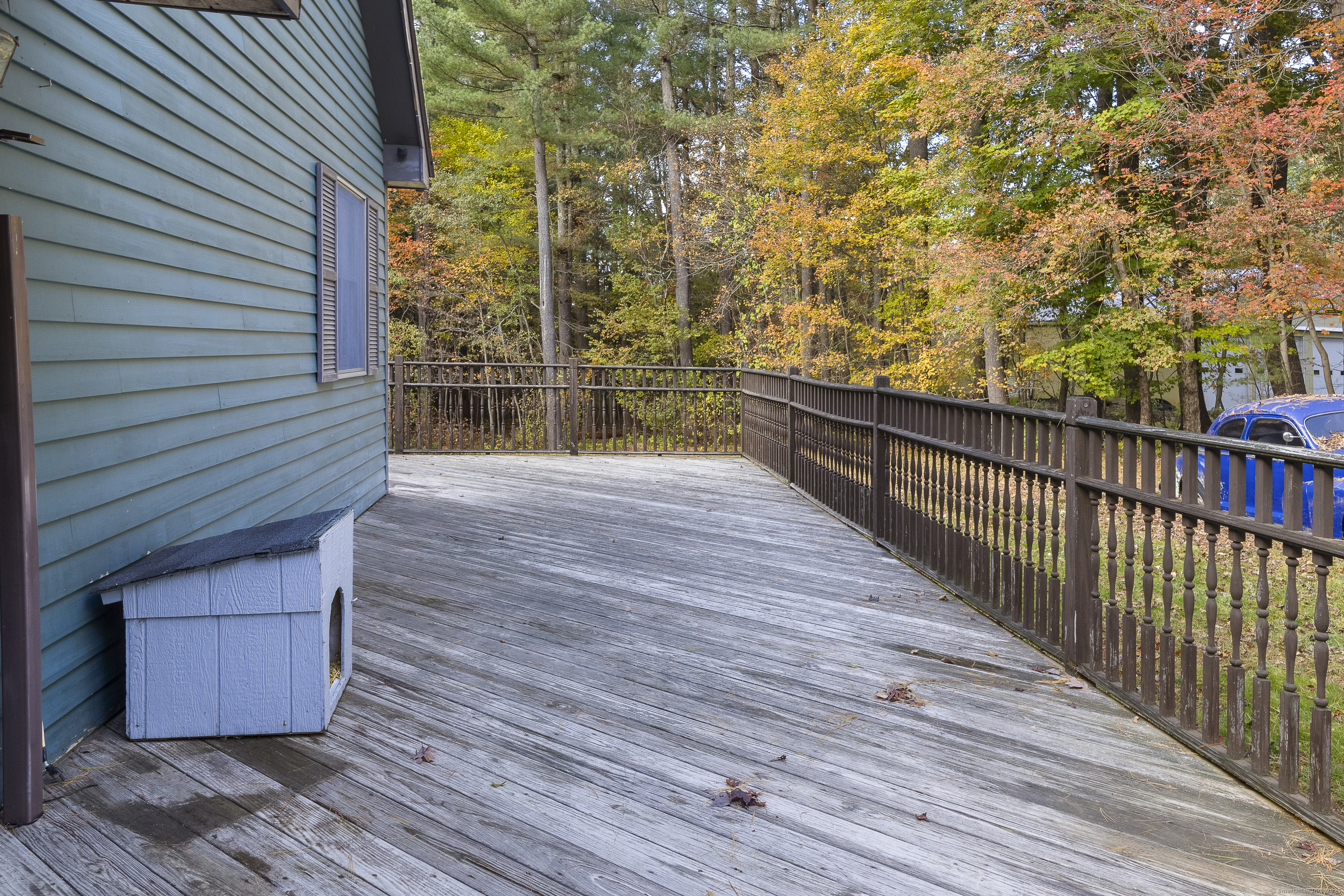 160 Munyan Road Putnam, CT 06260 - Photo 33 of 36 a view of balcony with wooden floor and seating space