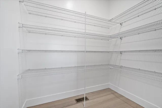 a view of a room with racks on the wall