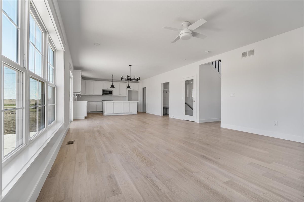 24 Stonehouse Court Bloomington, IL 61705 - Photo 18 of 45 a view of a kitchen with a sink and a window