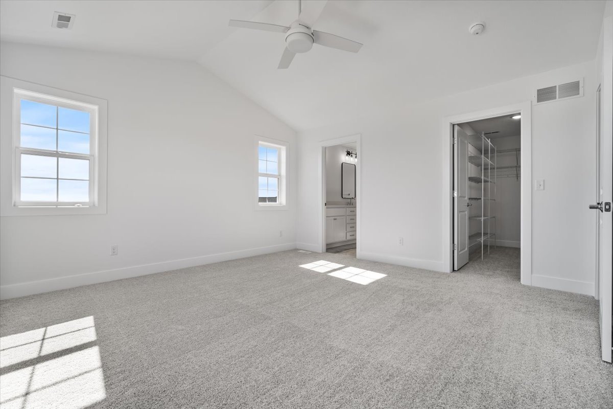 24 Stonehouse Court Bloomington, IL 61705 - Photo 25 of 45 an empty room with windows