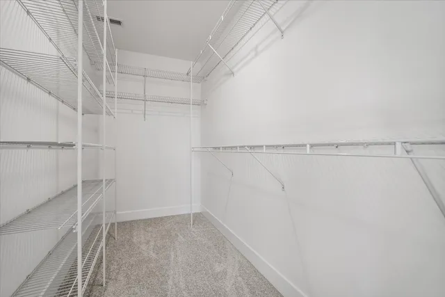 a view of a room with racks on the wall