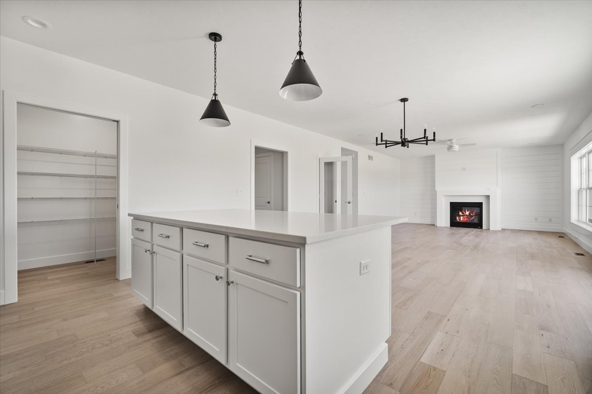 24 Stonehouse Court Bloomington, IL 61705 - Photo 10 of 45 a view of a center island in the kitchen