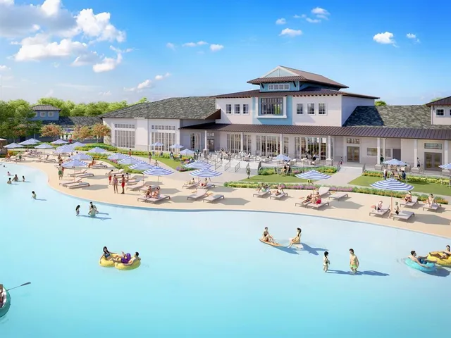 a view of a swimming pool with outdoor seating