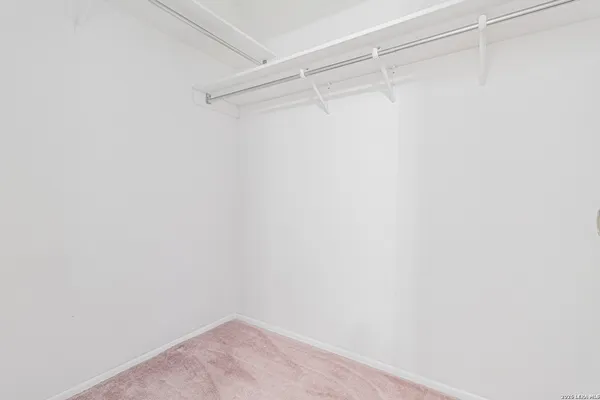 a view of a room with racks on the wall