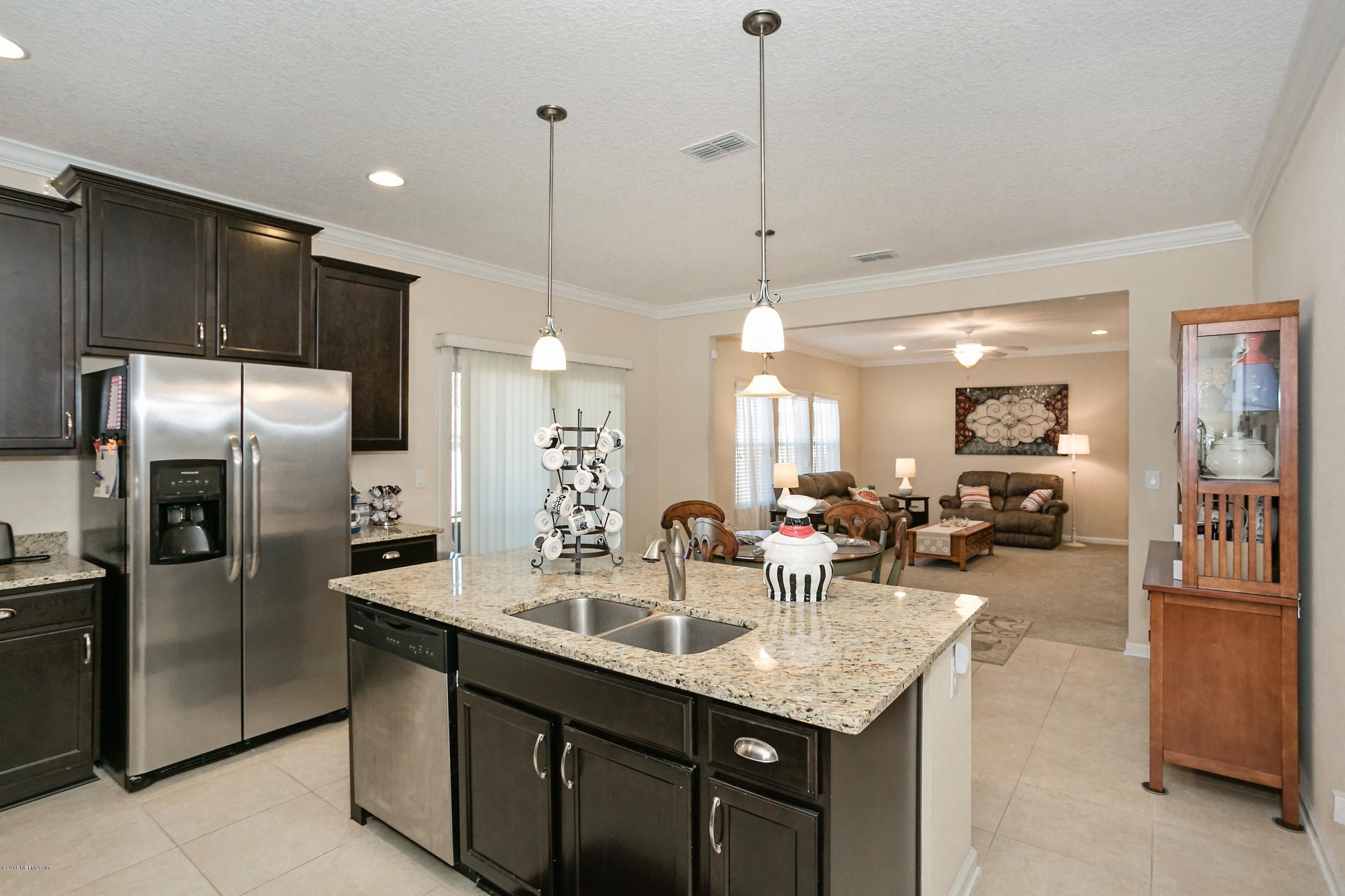1178 Ballard Ridge Road Jacksonville, FL 32211 - Photo 9 of 22 011_Kitchen to Living Area