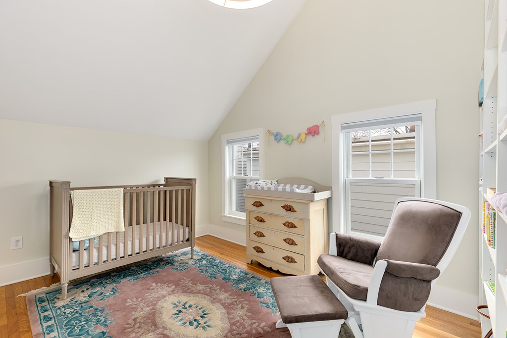 55 6th Street, Unit 55 Cambridge, MA 02141 - Photo 13 of 21 a bedroom with furniture and a window