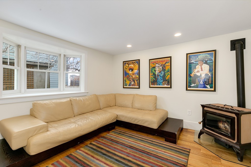 55 6th Street, Unit 55 Cambridge, MA 02141 - Photo 4 of 21 a living room with furniture and a window