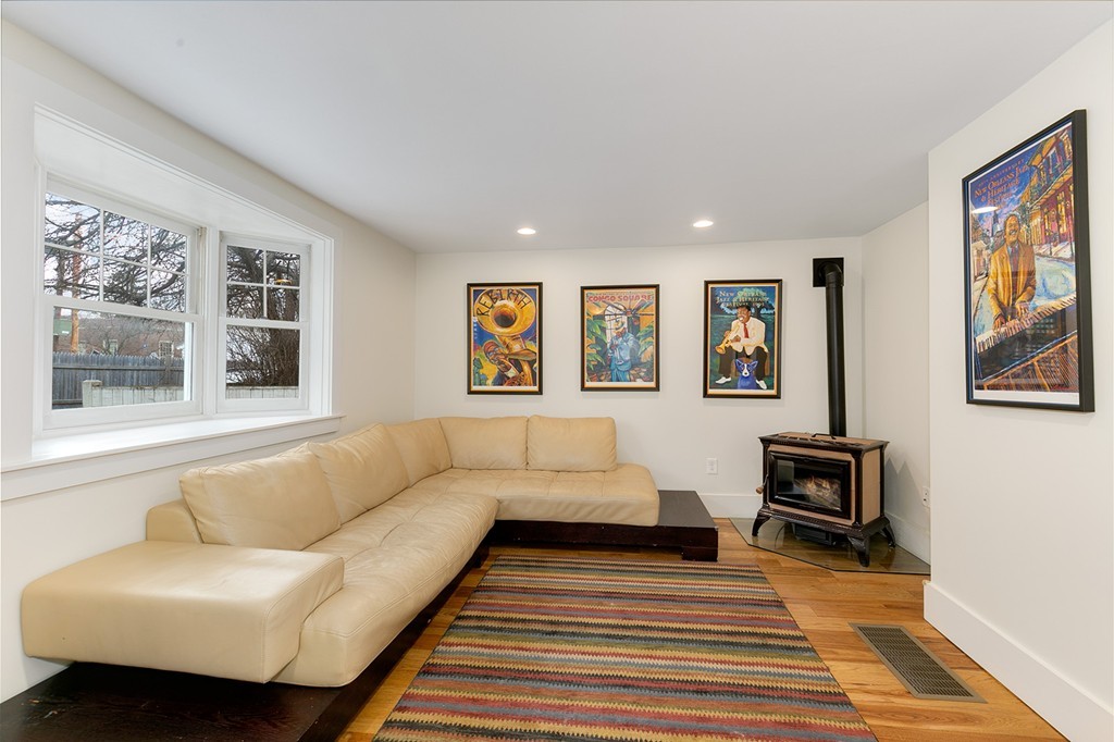 55 6th Street, Unit 55 Cambridge, MA 02141 - Photo 5 of 21 a living room with furniture and a window