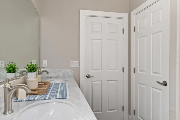 a bathroom with a sink and a bathtub