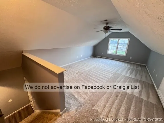 a view of a swimming pool and a yard