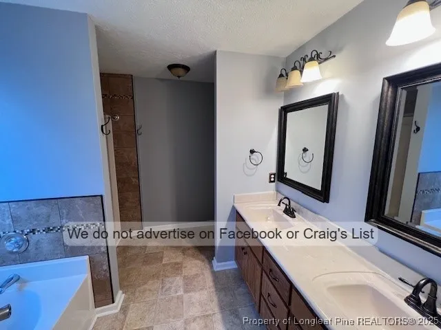 a bathroom with a toilet and a sink