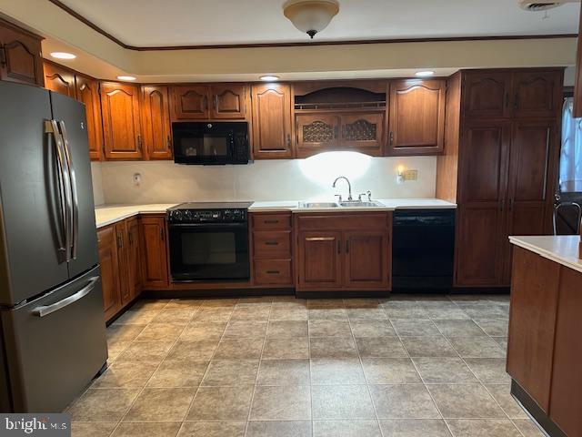 355 George Street Hanover, PA 17331 - Photo 15 of 44 a kitchen with stainless steel appliances granite countertop a refrigerator and a stove