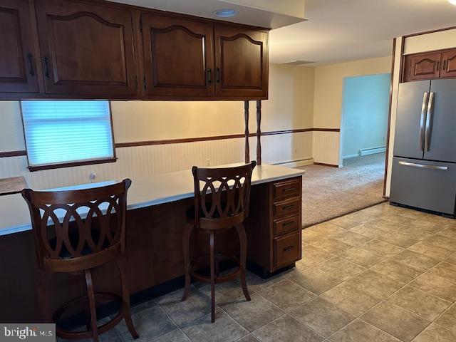 355 George Street Hanover, PA 17331 - Photo 16 of 44 a kitchen with stainless steel appliances granite countertop a refrigerator and a stove top oven